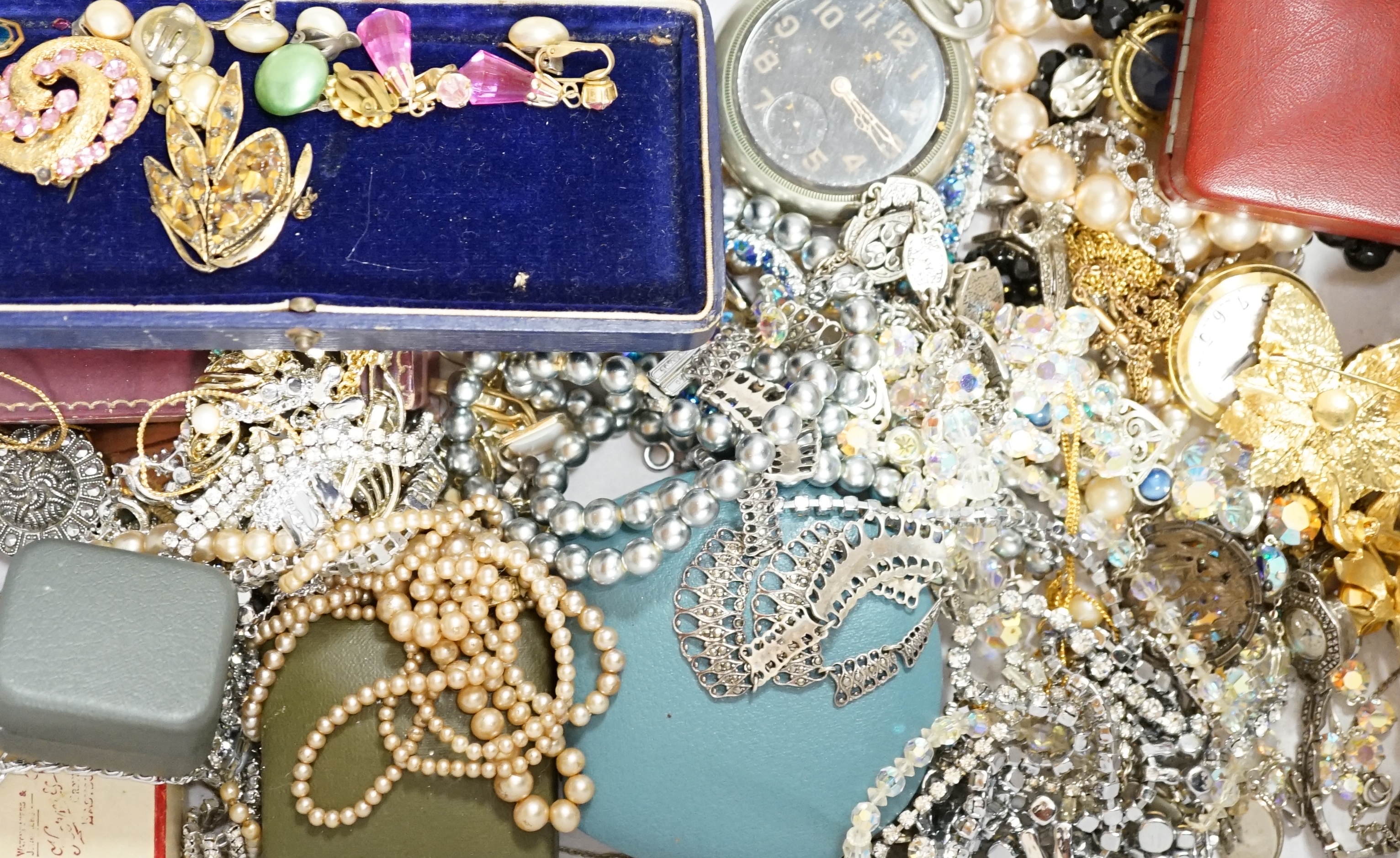 A collection of costume jewellery, some silver to include two 9ct gold cross pendants, marcasite brooches/necklaces and a pair of butterfly wing earrings. Condition - fair